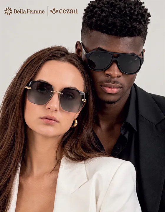 Casal usando óculos de sol das linhas Della Femme e Cezan